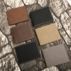 Colorful man wallet. Concept shot, top view, different colors man wallet. Special background man wallet view. Men fashion and accessories.