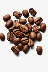 Naklejka premium A pile of coffee beans on a white surface. Suitable for coffee-related content or as a background for coffee promotions