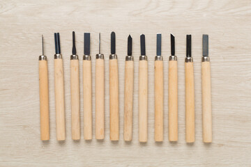Carpenter tools on wooden background,top view