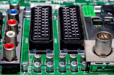 Electronic components on the board of an old TV