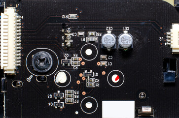 Electronic components on the board of an old TV