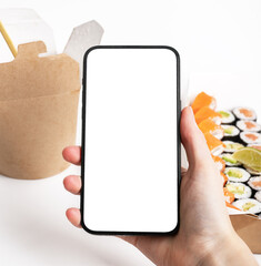 Hand holding mobile phone screen mockup, smartphone display mock up for delivery service
