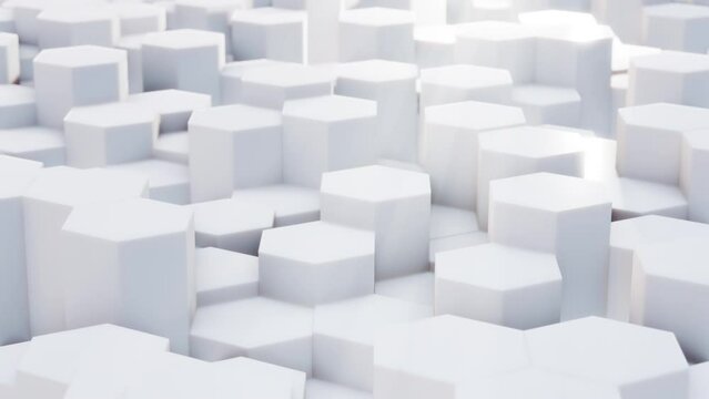 White moving hexagons pistons in the light of the spotlight. Seamless loop abstract background with rods of a thermonuclear reactor in the process of generating clean nuclear energy, 3d render.