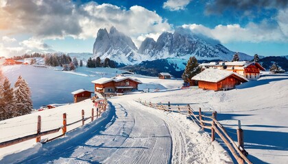 panoramic winter view of alpe di siusi village bright winter landscape of dolomite alps with country road snowy outdoor scene of ski resort ityaly europe vacation concept background - obrazy, fototapety, plakaty