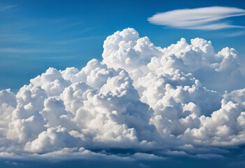 a canvas of azure and white fluffiness. Atmospheric front bringing a change in weather on a sunny day. Epic backdrop for design.