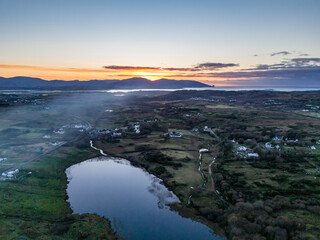 Smoke over Lough Fad due to traditionally burning of waste in rural Ireland - County Donegal