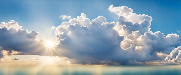 Fluffy white clouds against a sunny blue sky. Bright sky background with sunlight filtering through clouds. Scenic panoramic view.