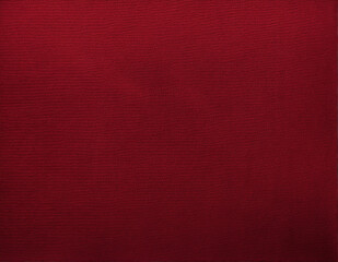 Fototapeta premium Vintage burgundy cotton fabric with a rough texture.