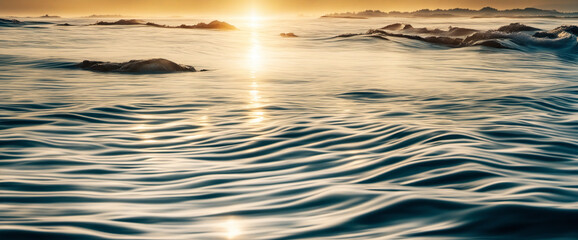 Water background with light reflections and rippling waves.