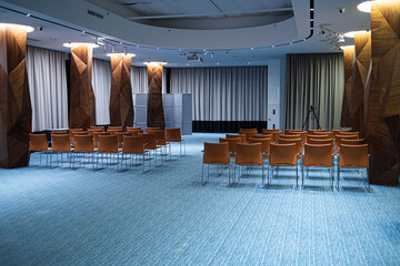 empty chairs and table in modern conference hall