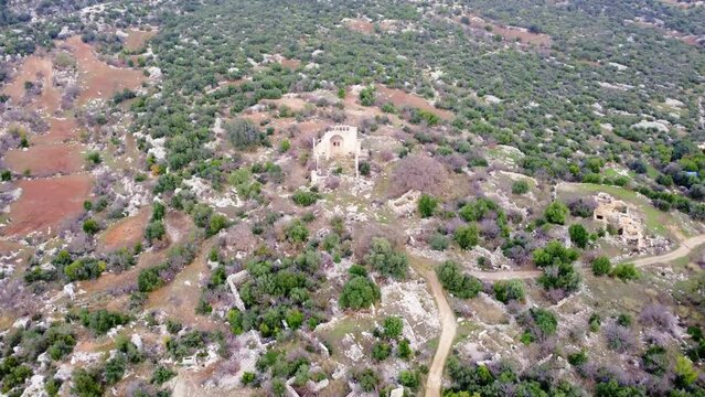 Drone explores Okuzlu's basilica ruins, unveiling travel treasures. Historic Okuzlu by air: travel back to basilica's past. Okuzlu's aerial travel glimpse: Basilica's ancient beauty