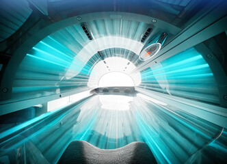 Inside view of Tanning Bed UV solarium light for skin darkening - obrazy, fototapety, plakaty