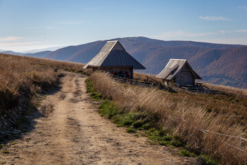 View of the Bieszczady Mountains from Połonina Wetlińska. Barn in the mountains during autumn sesion.  © Leszek Szelest