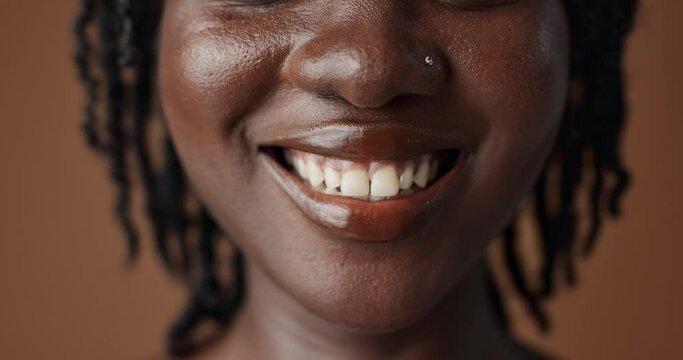Woman, teeth closeup or smile for dental care, oral hygiene or healthy wellness on brown background. Mouth, lips or face of a happy model in studio for tooth whitening, beauty or dentist treatment