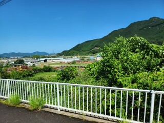 Fototapeta premium Plant Sky Mountain Fence Building Land lot