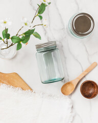Top view of empty mason jar on marble kitchen counter