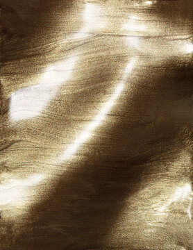 Gold metallic shimmering glossy nail polish composition background. Cosmetic makeup product texture