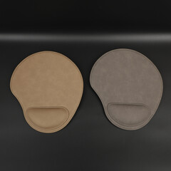 Leather mousepads in different colors. Concept shot, top view. Custom black background, leather mousepad. Free space for text.
