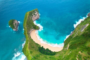 Foto op Canvas Cinematic aerial landscape shots of the beautiful island dinosaur of Nusa Penida. Huge cliffs by the shoreline and hidden dream beaches with clear water. © Kate