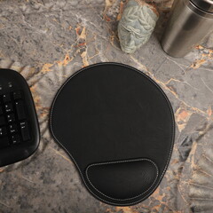 Leather mousepads in black colors. Concept shot, top view. Custom background, leather mousepad....