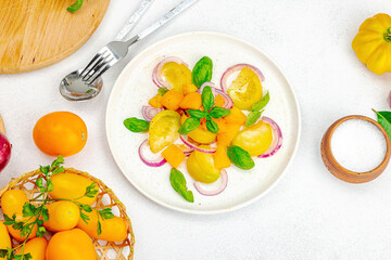 A set of ingredients for preparing a vegetable salad. Fresh and healthy vegetables, herbs, spices