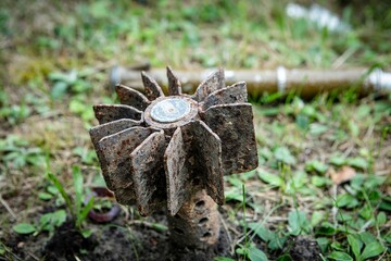 a unique collection of photographs of explosive objects, mines, shells and rockets, used in various military conflicts.