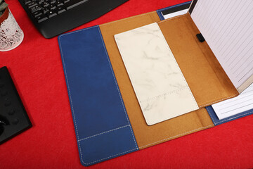 Leather portfolio. Concept shot, top view, portfolio in different colors. Custom background flap...