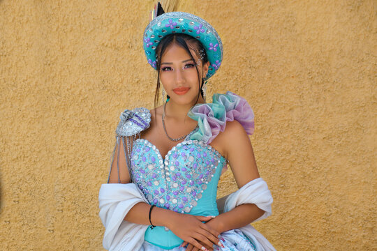 young latin woman with bolivian folkloric costume morenada