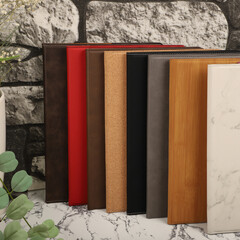 Leather portfolio. Concept shot, top view, portfolio in different colors and leather pen. Custom background flap portfolio view. Portfolio and accessories.