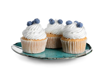 Plate of tasty cupcakes with blueberries on white background