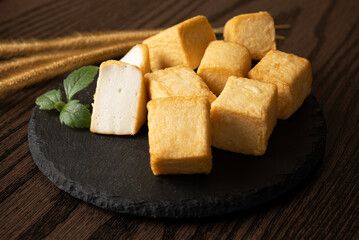 Fired TOFU on the wood table Asian Chinese Japanese theme