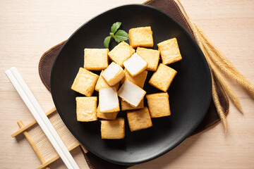 Fired TOFU on the wood table Asian Chinese Japanese theme