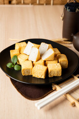 Fired TOFU on the wood table Asian Chinese Japanese theme