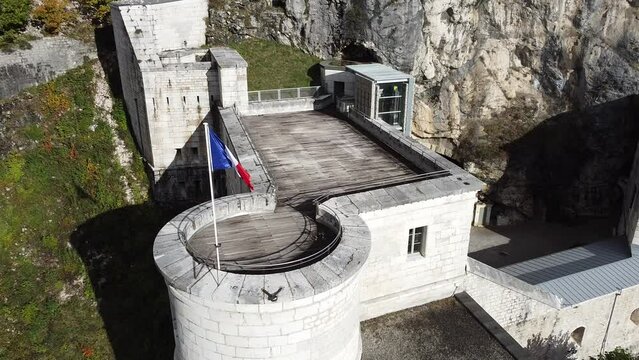French flag flutter on top of Fort l'Ecluse - Drone 4K
