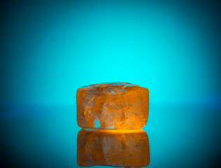 ice for the product presentation podium. beautiful natural ice with orange-gold backlight for the...