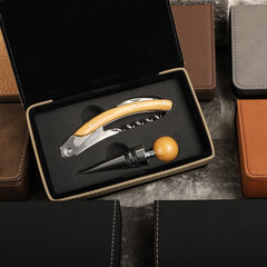 Wine opener set in leather box. Colorful leather boxes. Wine opener and cork. Close-up, top view,...