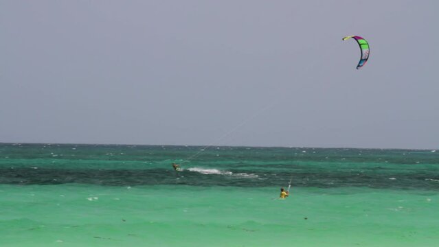 Kite Surfers Surfing in Beautiful Ocean Water