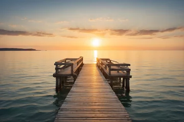 Fototapete Rund A quiet pier without people overlooking the open sea at sunset © M. Faisal Riza
