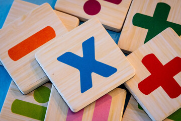 Colorfularithmatic symbols on wooden magnets