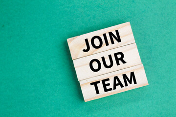 wooden arrangement with the words Join Our Team. HR concept. new member concept