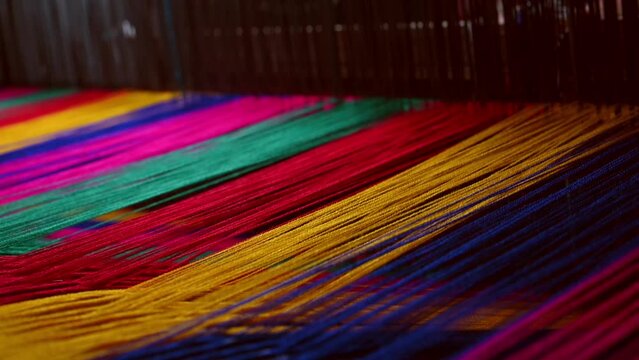 Traditional Mexican way of making cloth with colorful fabric.