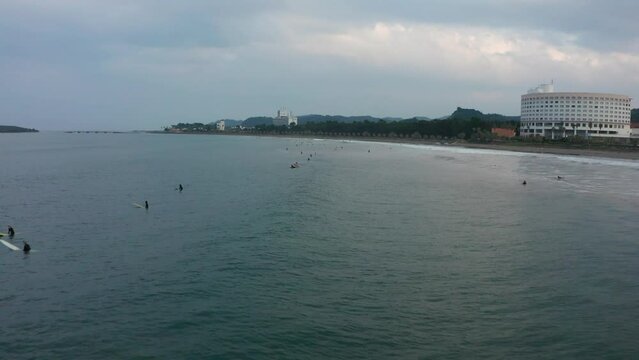 Drone flight over surfers in Aoshima Miyazaki