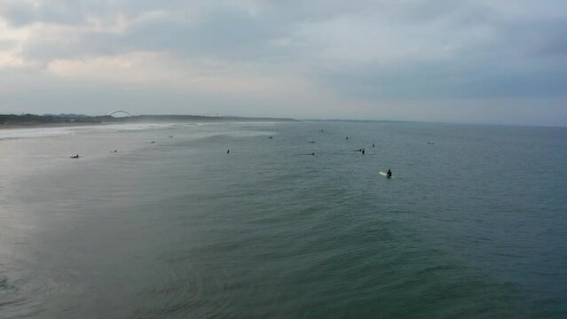 Drone flight over surfers in Aoshima Miyazaki