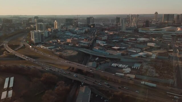 Drone Aerials of evening traffic near a busy downtown area