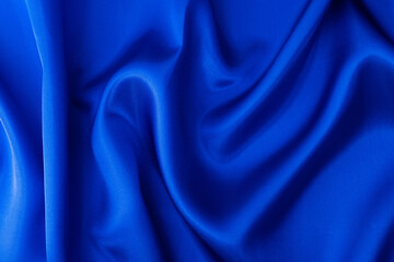 Close up of dark blue silk background