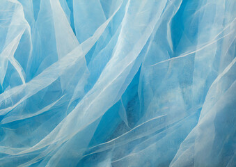 Fototapeta premium 水色のオーガンジーの背景テクスチャー