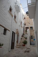 White stone houses in Polignano a Mare city with no people 