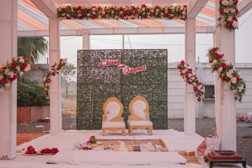 Wedding Stage Decoration A stunning wedding stage decorated with two chairs