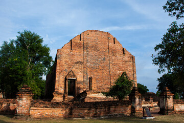 Ancient ruins ubosot ordination hall and antique old ruin stupa chedi for thai people travelers travel visit respect pray myth mystical in Wat Maheyong temple on December 3, 2023 in Ayutthaya Thailand