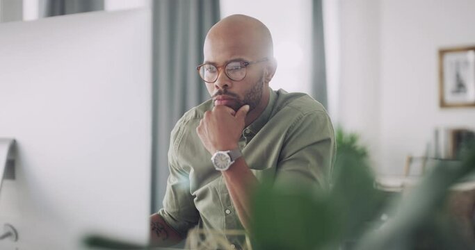 Business man, computer and typing a proposal in office, review and online research for work. Black male person, information and professional in workplace, planning and writing an email with internet